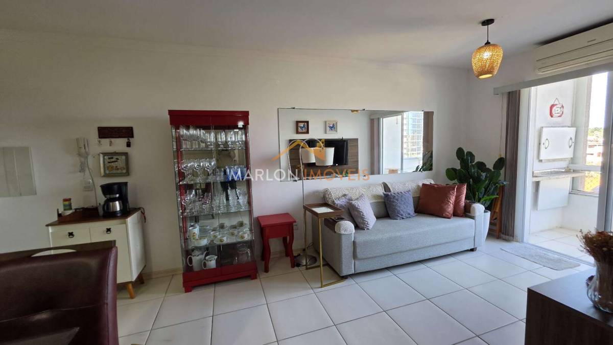  - Apartamento à venda em Torres/RS com 3 dormitórios, suiíte, churrasqueira e garagem.