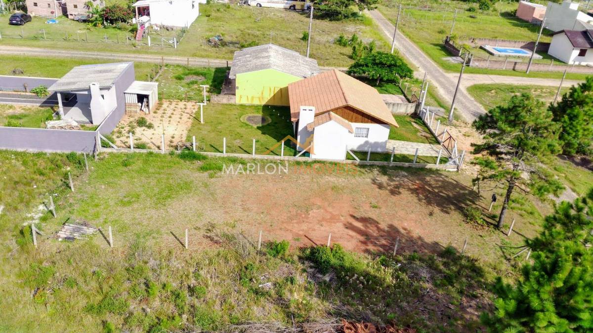  - Ótimo terreno, frente norte com 360m² , aterrado e pronto para construir em Torres/RS